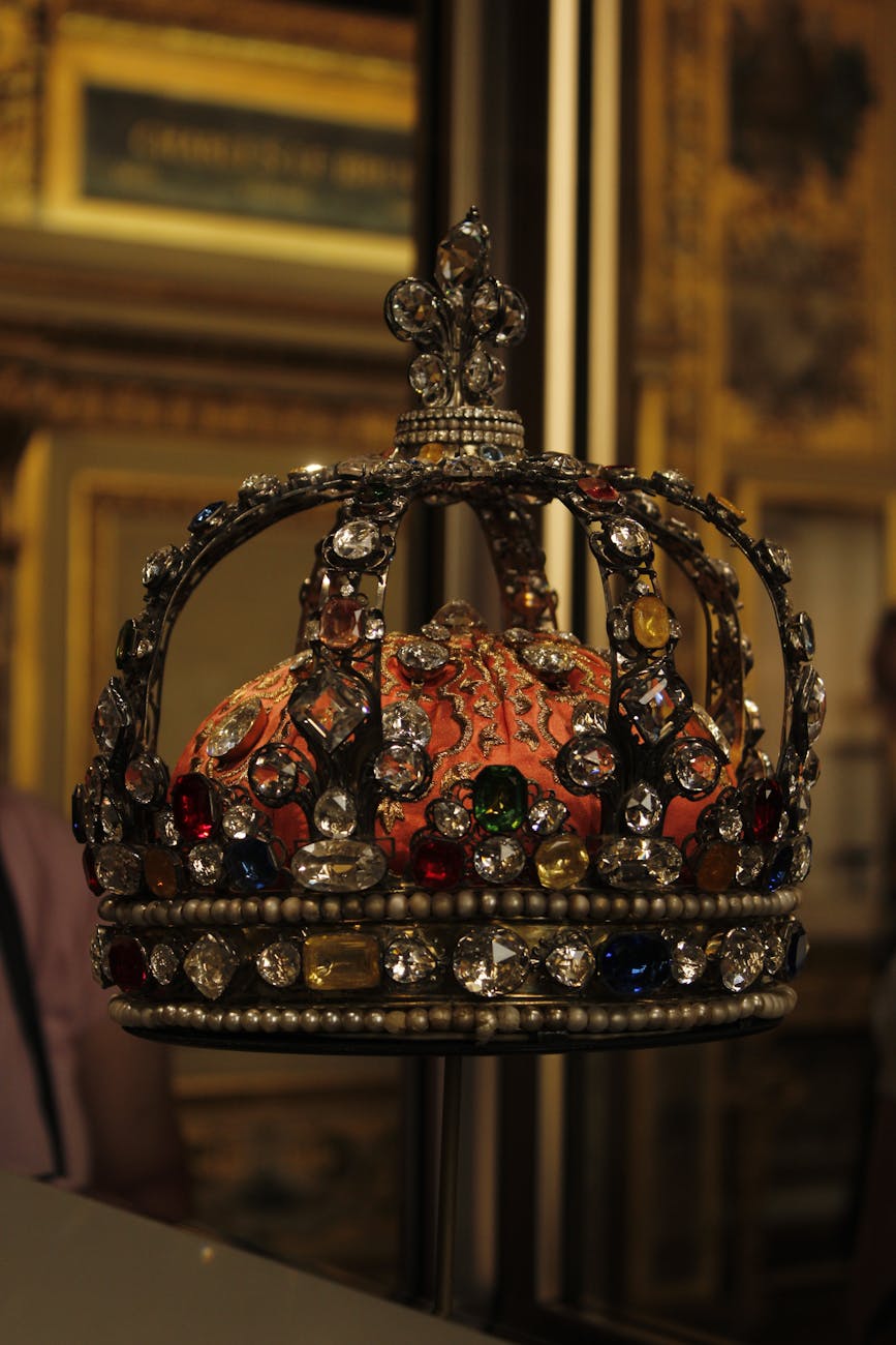 ornate jewel covered crown in paris museum